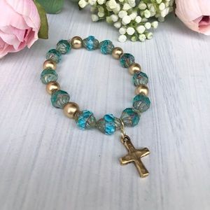 Beautiful beaded blue and gold cross bracelet